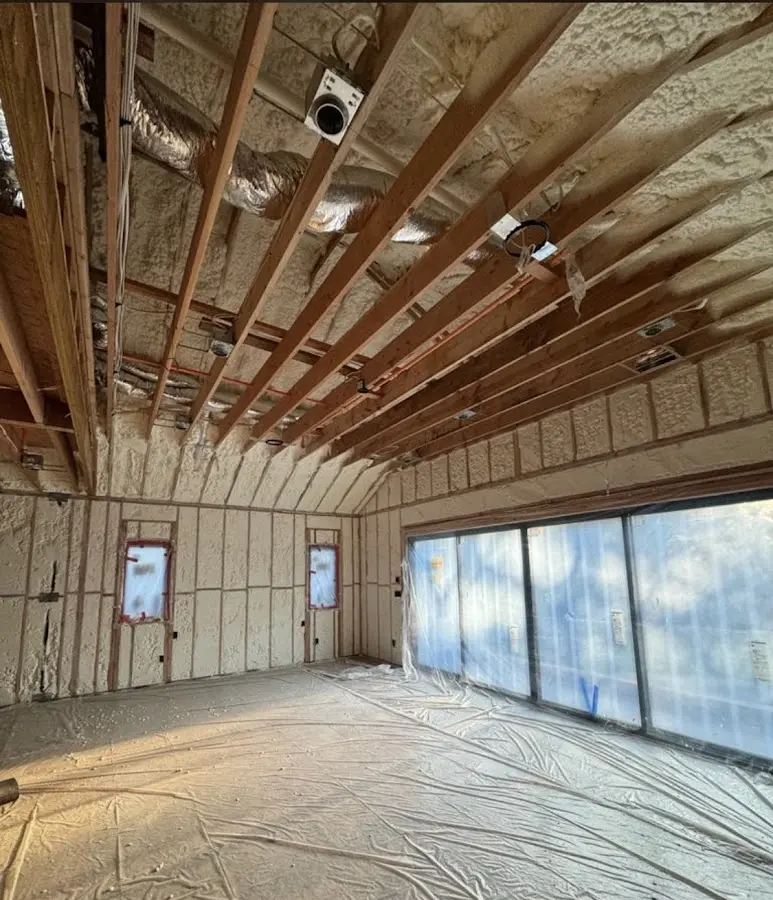 Interior walls and ceiling insulated with spray foam during new construction in Leander